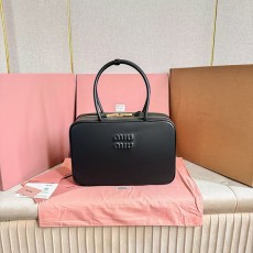 미우미우 가죽 탑 핸들백 코냑 5BB117-3009